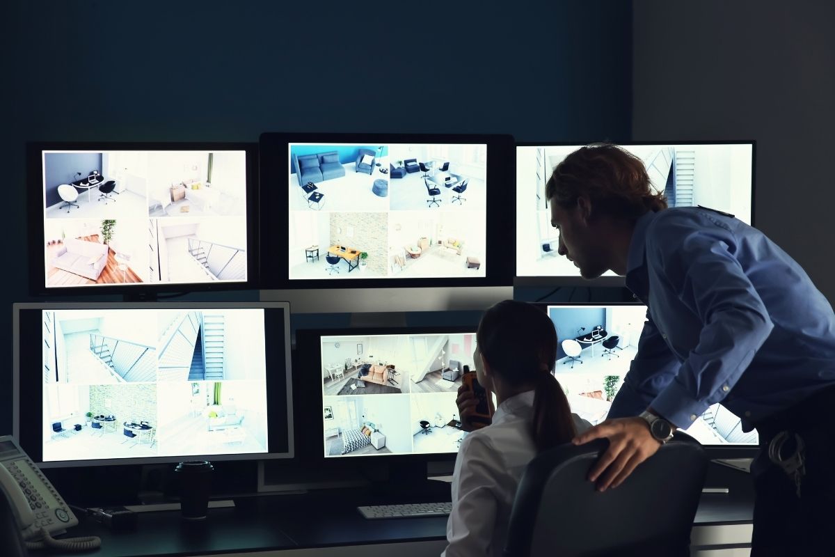 CCTV operator monitoring screens